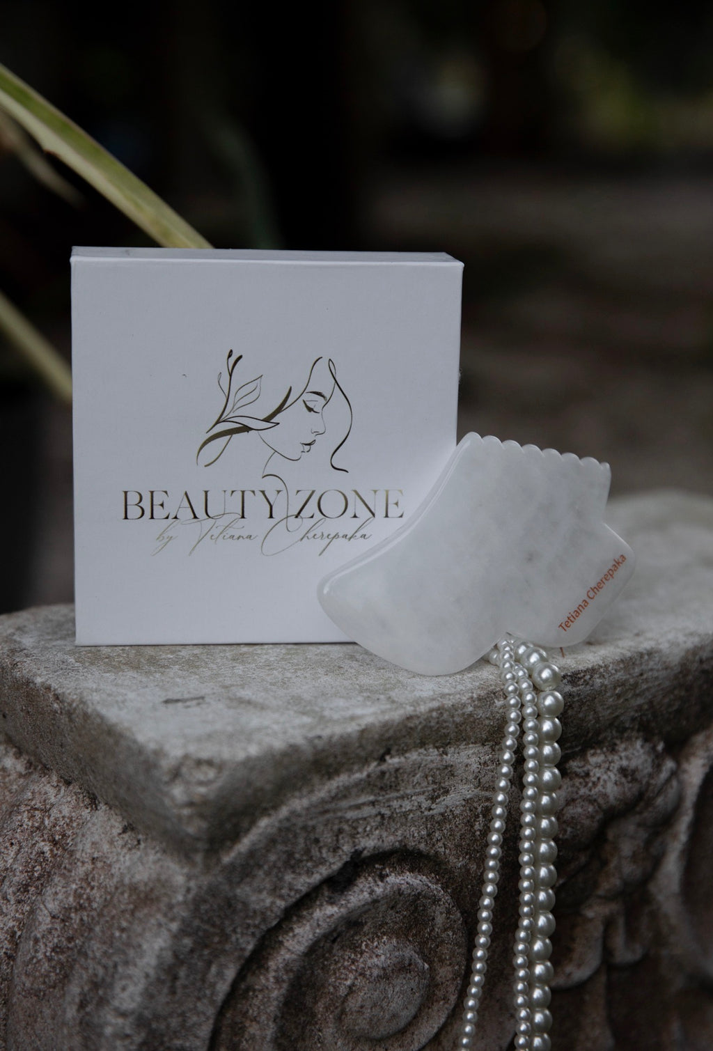 White jade gua sha by Tetiana Cherepaka